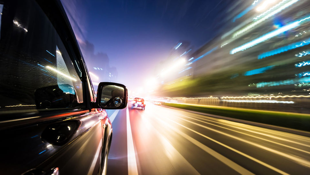 Long-exposure of cars and street lights on highway